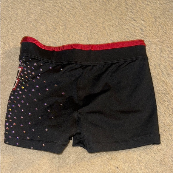 Black and Red Navarro Cheer Shorts with DAWGS written on side - Picture 2 of 3